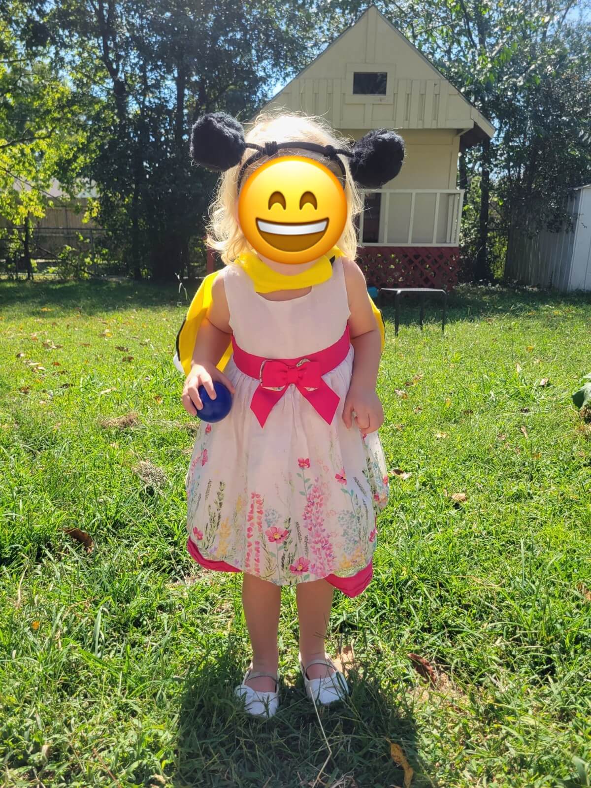 Bee No-Sew Wings with antennas looking at flower
