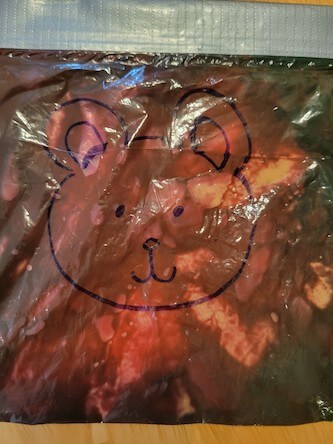 Mixed brown paint in a bag
