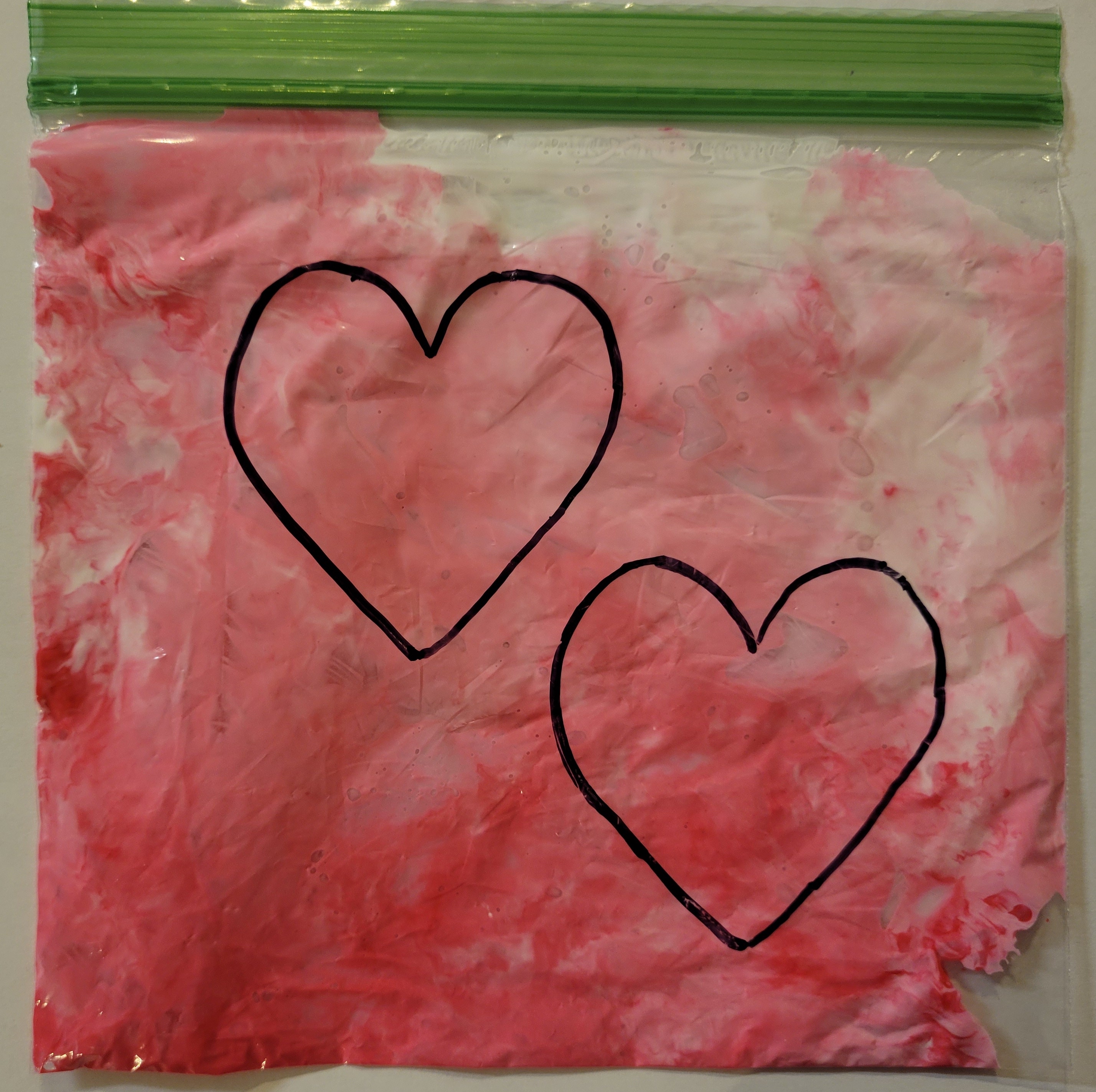 Pink paint in a bag